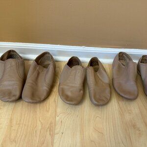 Girls Tan Capezio Jazz Shoes. Each pair is $15